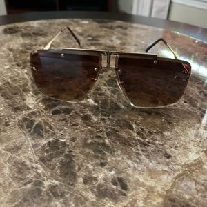 Amber tinted shades with gold frame